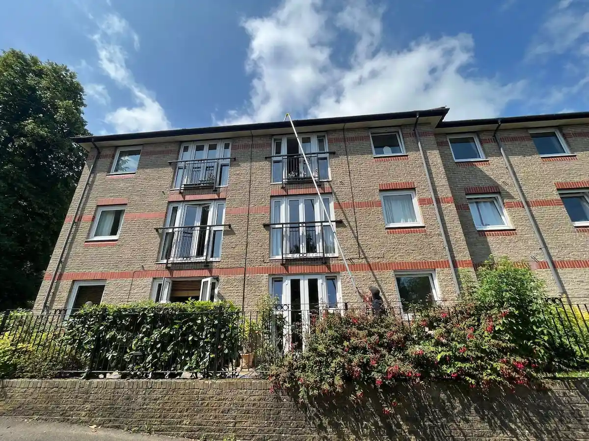 Terraced house gutters cleared with the high-reach vac